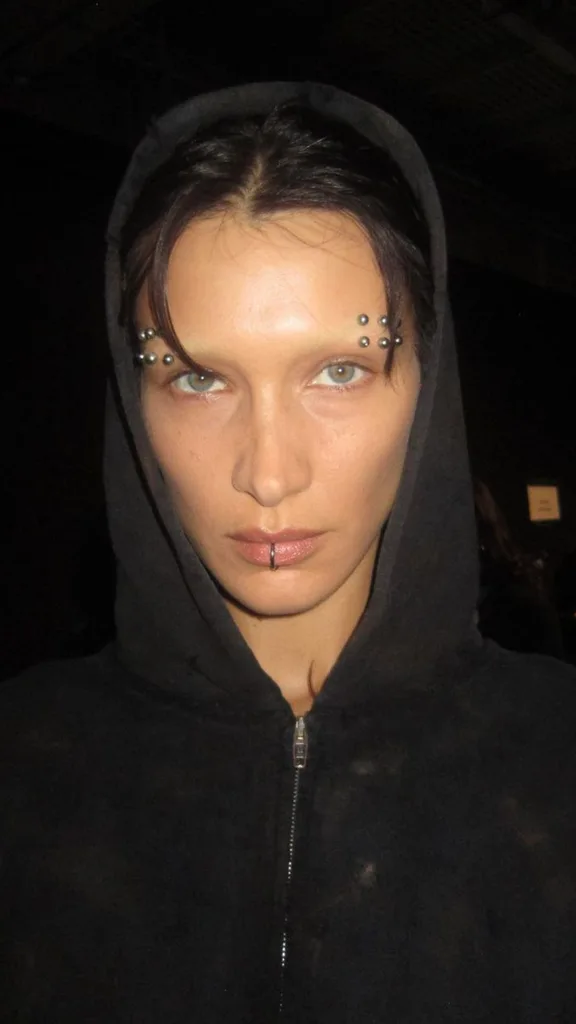 bella hadid wearing fake piercings for balenciaga