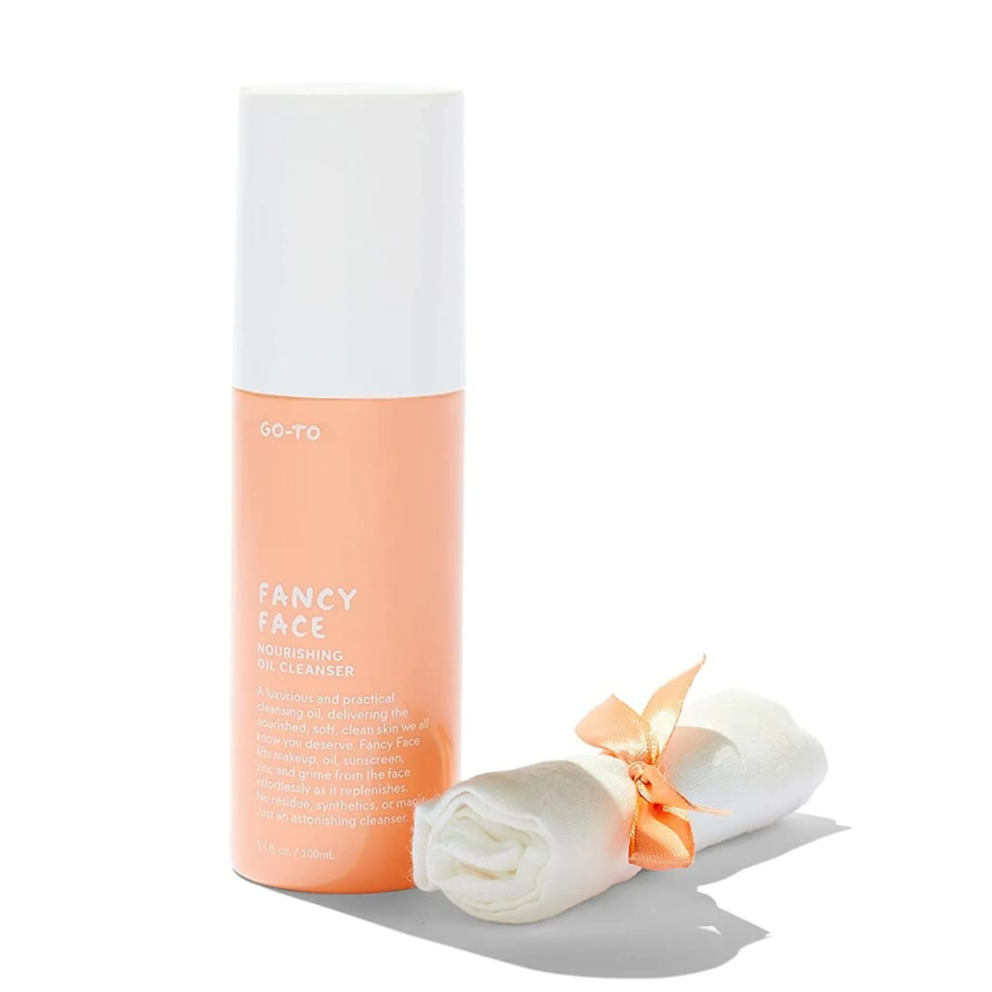 Oil cleansers like Fancy Face Cleansing Oil from Go-To Skincare will rapidly dissolve makeup, sunscreen, dirt, and impurities and then turn into a milky emulsion, leaving skin totally clean, hydrated, and ready for a second cleanse. Fancy Face comes in a peach bottle with a pump dispenser and white cap.