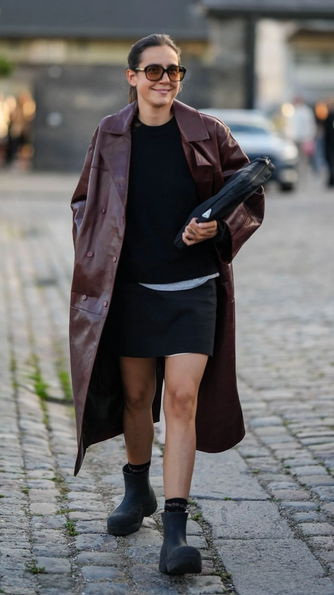 young gen z woman carries laptop to multiple jobs