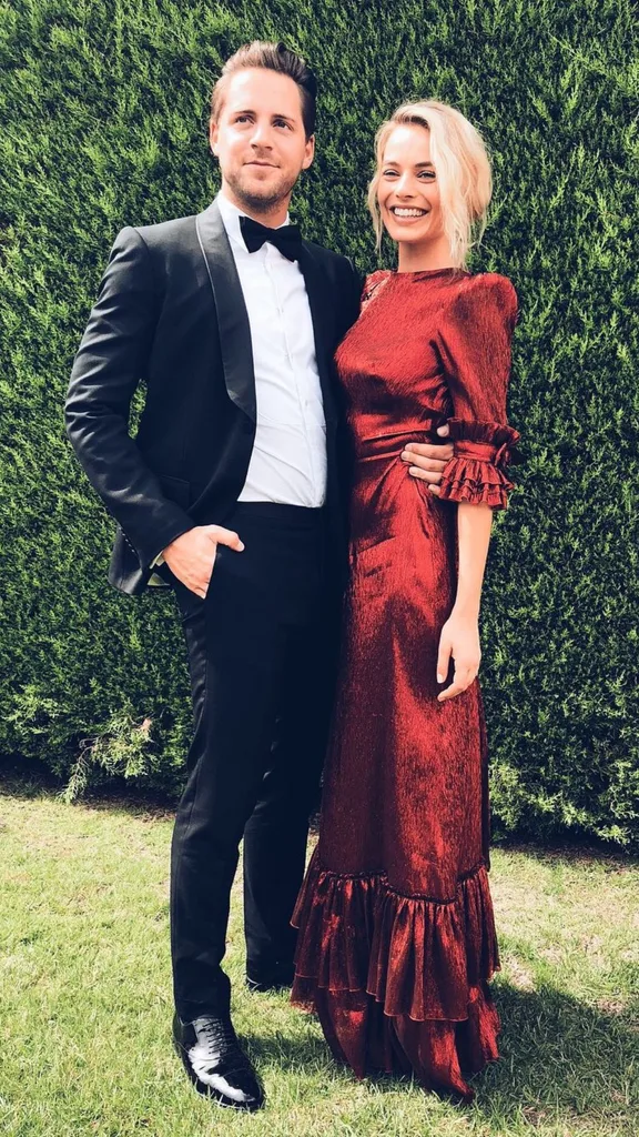 Margot Robbie and husband Tom Ackerley at a wedding in 2018