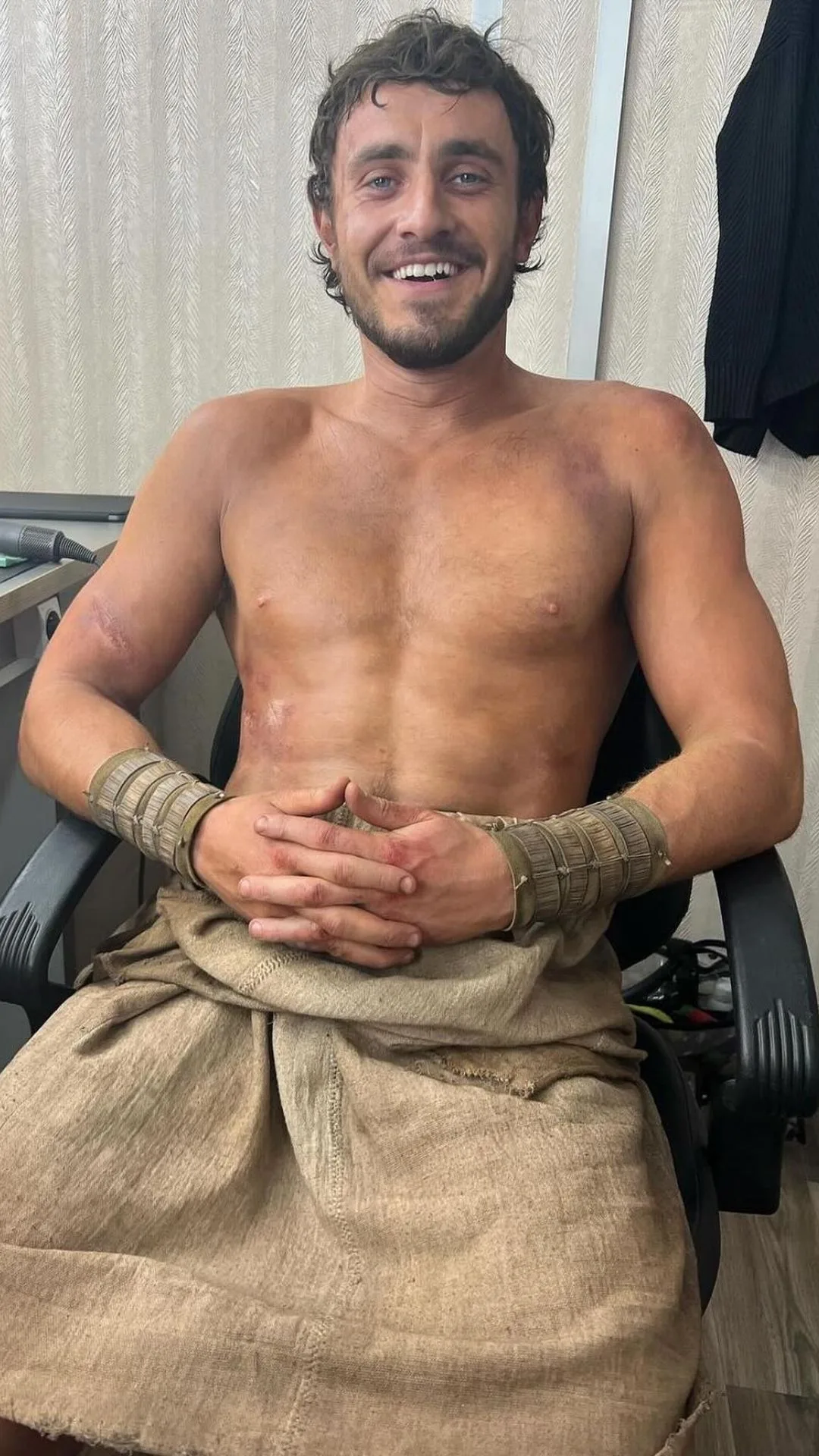 A candid shot of Paul Mescal on the set for Gladiator II.