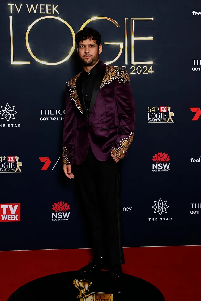 kyle shilling on the logies red carpet wearing hand painted suit jacket