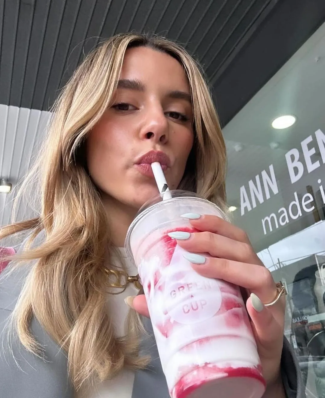 a strawberry skin smoothie from green cup
