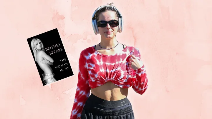 Addison Rae with a copy of Britney Spears memoir The Woman In Me