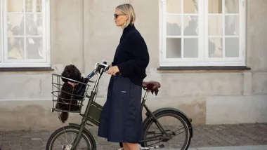 stylish woman with bike copenhagen