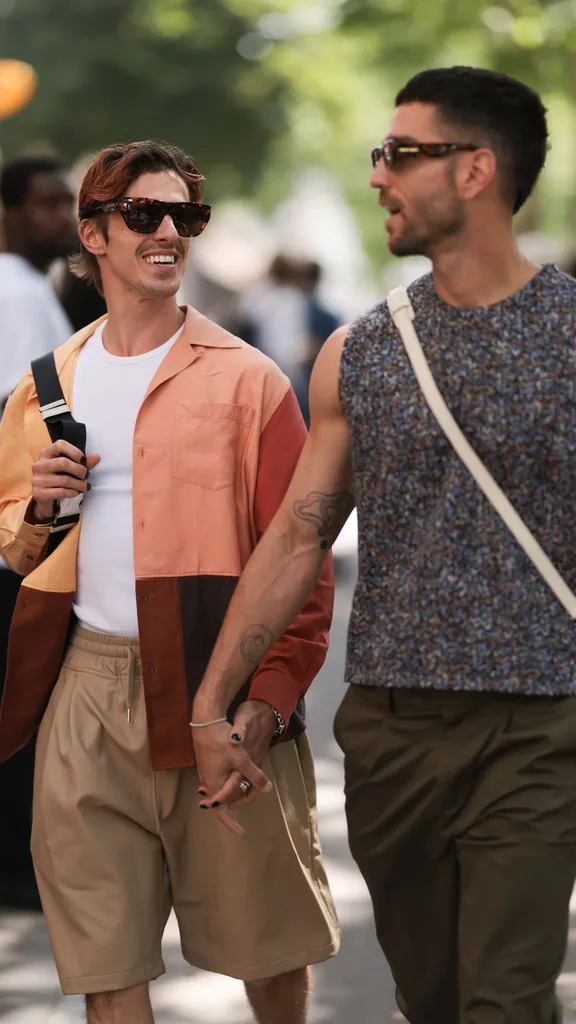 couple engaged in conversation holding hands on a date