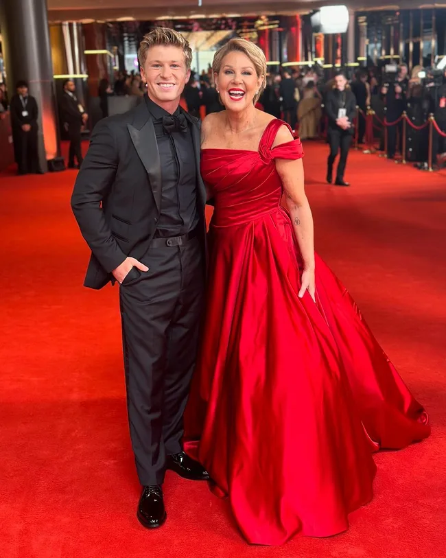 robert irwin and julia morris in red dress on the logies red carpet 2024