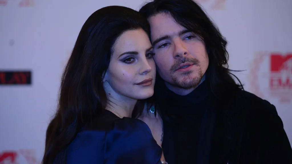 US singer-songwriter Lana Del Rey and her boyfriend Barrie James O'Neill pose for photographers on the red carpet for the 2012 MTV European Music Awards (EMA) at the Festhalle in Frankfurt am Main, central Germany on November 11, 2012. 