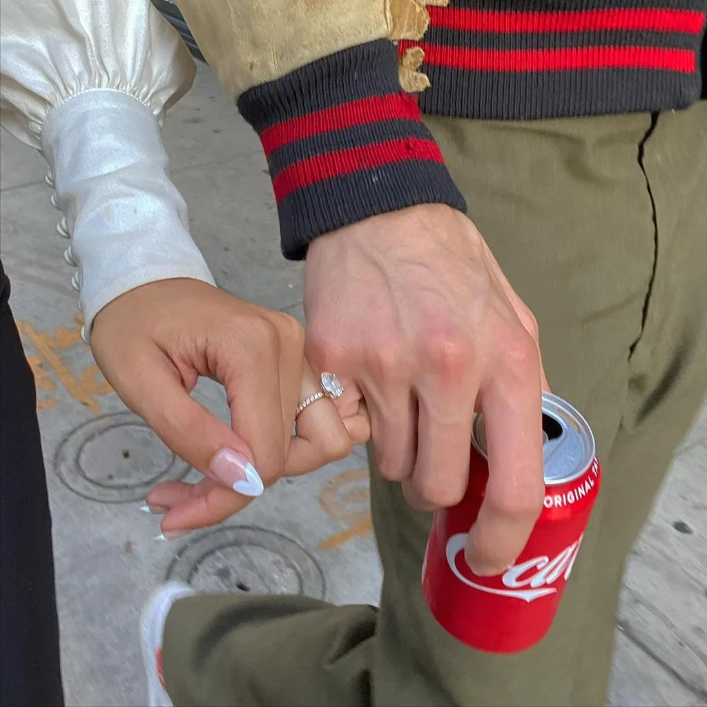 nara smith shows engagement ring holding hands with lucky blue smith