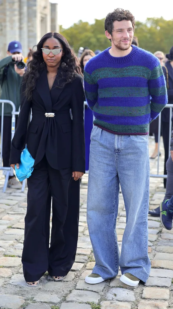 Ayo Edebiri and Josh O'Connor attend the Loewe Paris Womenswear Spring-Summer 2025 show as part of Paris Fashion Week on September 27, 2024 in Paris, France.