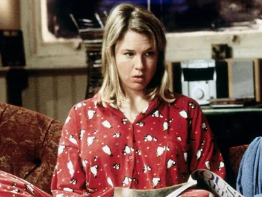 woman wears christmas day pyjamas