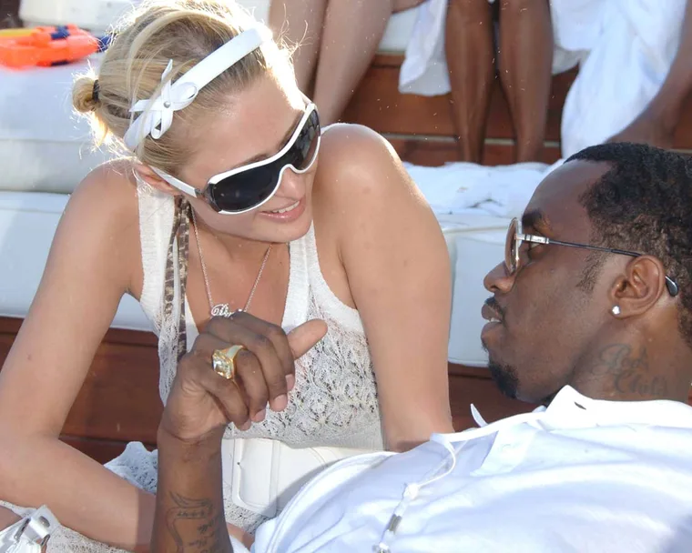 paris hilton and diddy at a white party