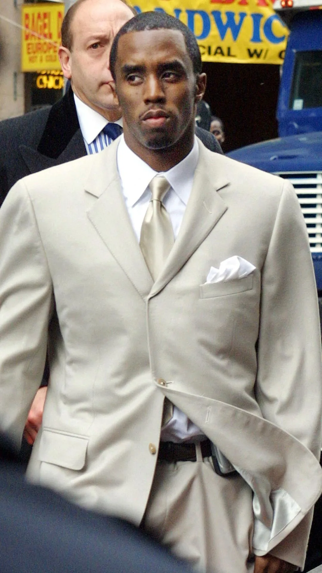 Rapper Sean "Puffy" Combs enters State Supreme Court in New York 14 March 2001. The jury was to begin deliberation 14 March after receiving instructions from the judge. Combs faces 15 years in prison if convicted on weapons and bribery charges related to a 1999 nightclub shooting.