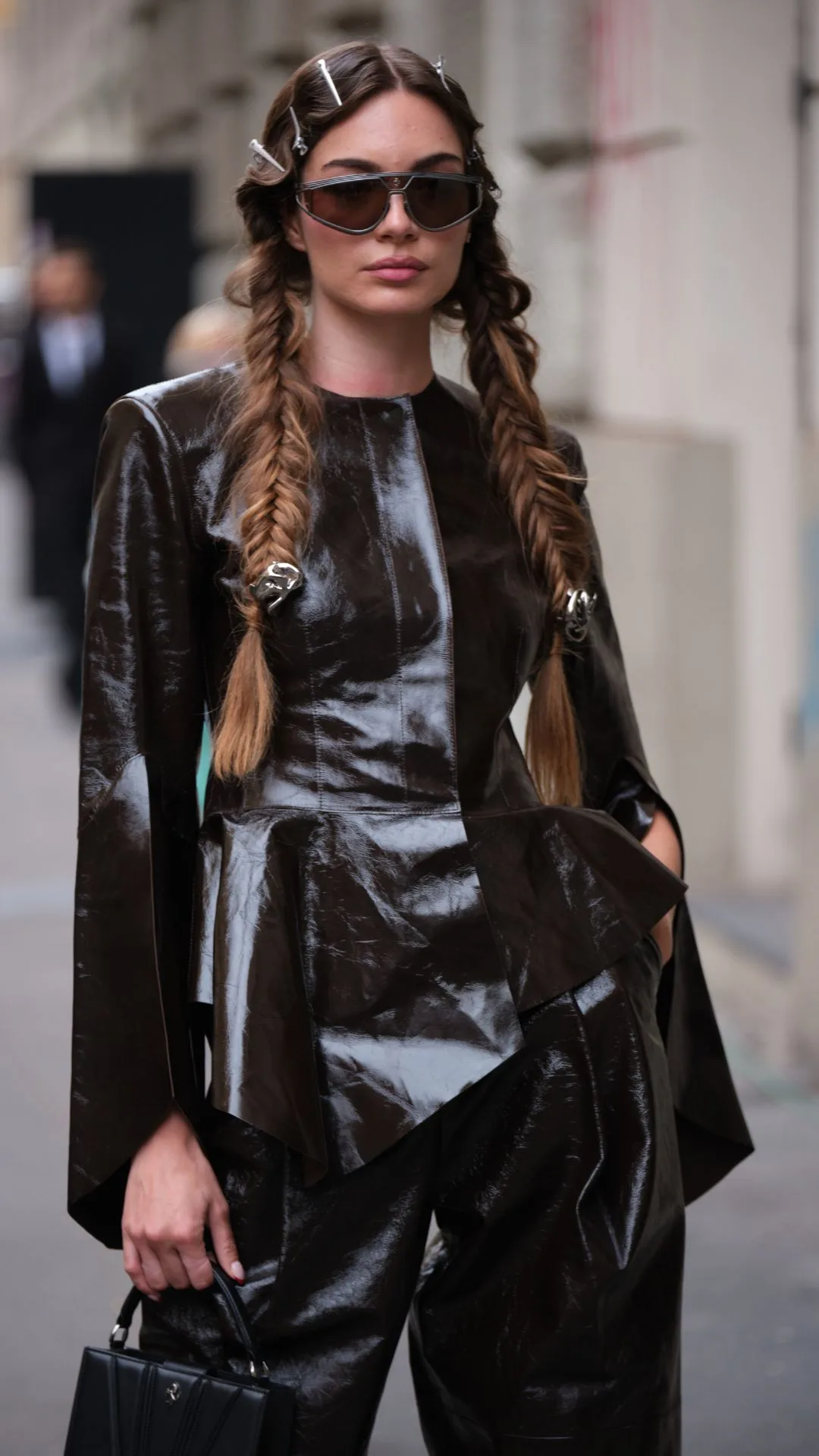 A guest wears jacket from leather in Ferrari during the Milan Fashion Week Menswear Spring/Summer 2025 on September 21, 2024 in Milan, Italy.