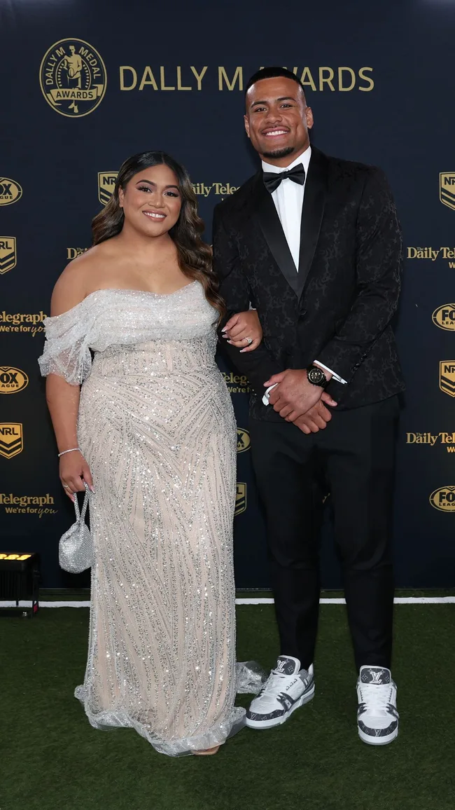 Stephen Crichton of the Bulldogs and Leone Lauafia dally m red carpet