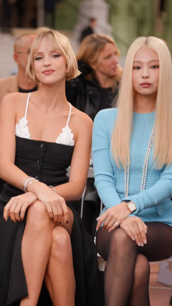Angèle and Jennie Kim at Chanel RTW Spring 2025 as part of Paris Ready to Wear Fashion Week held at Grand Palais on October 1, 2024 in Paris, France.