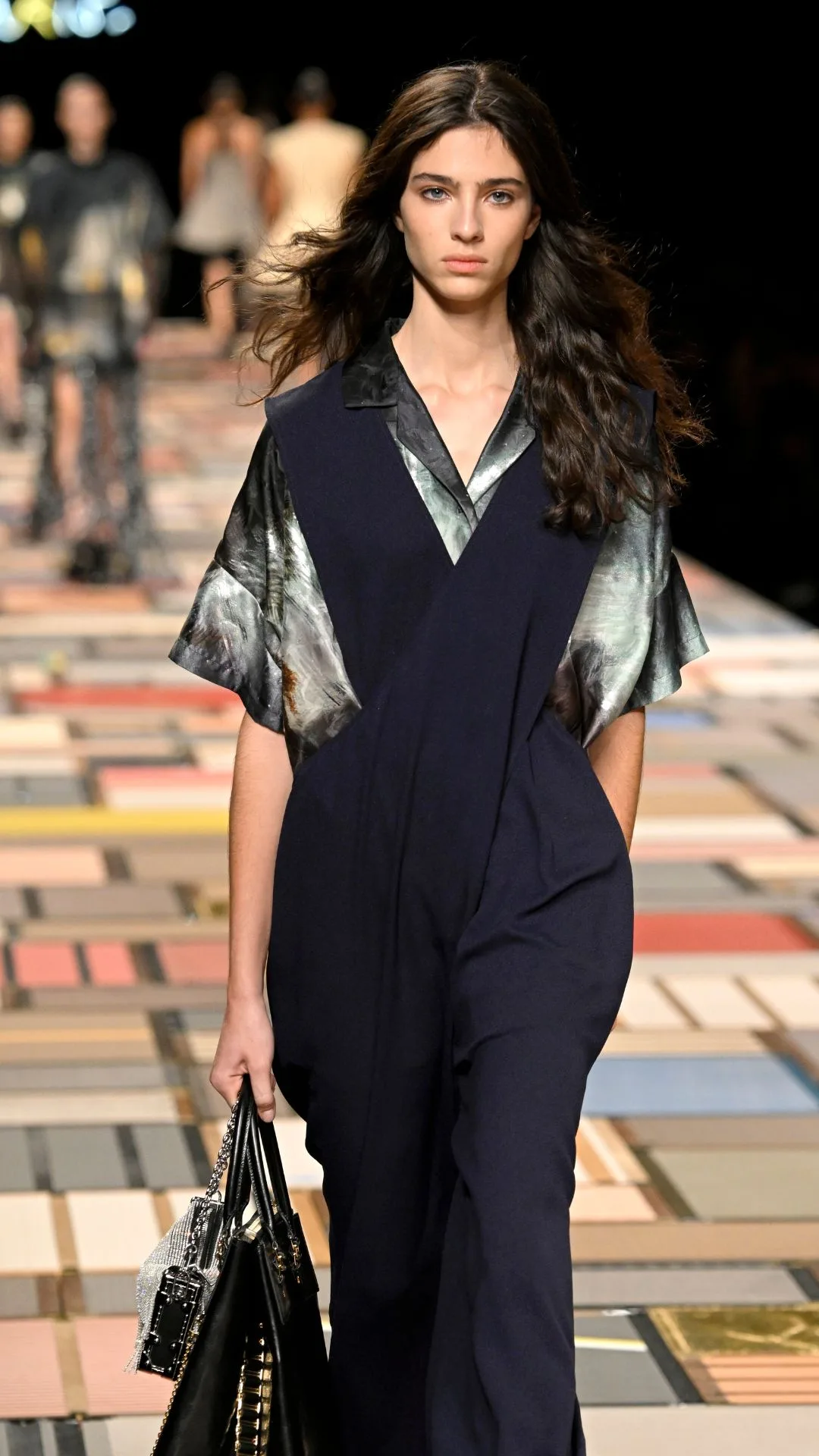 A model walks the runway during the Louis Vuitton Paris Womenswear Spring-Summer 2025 show as part of Paris Fashion Week on October 01, 2024 in Paris, France.