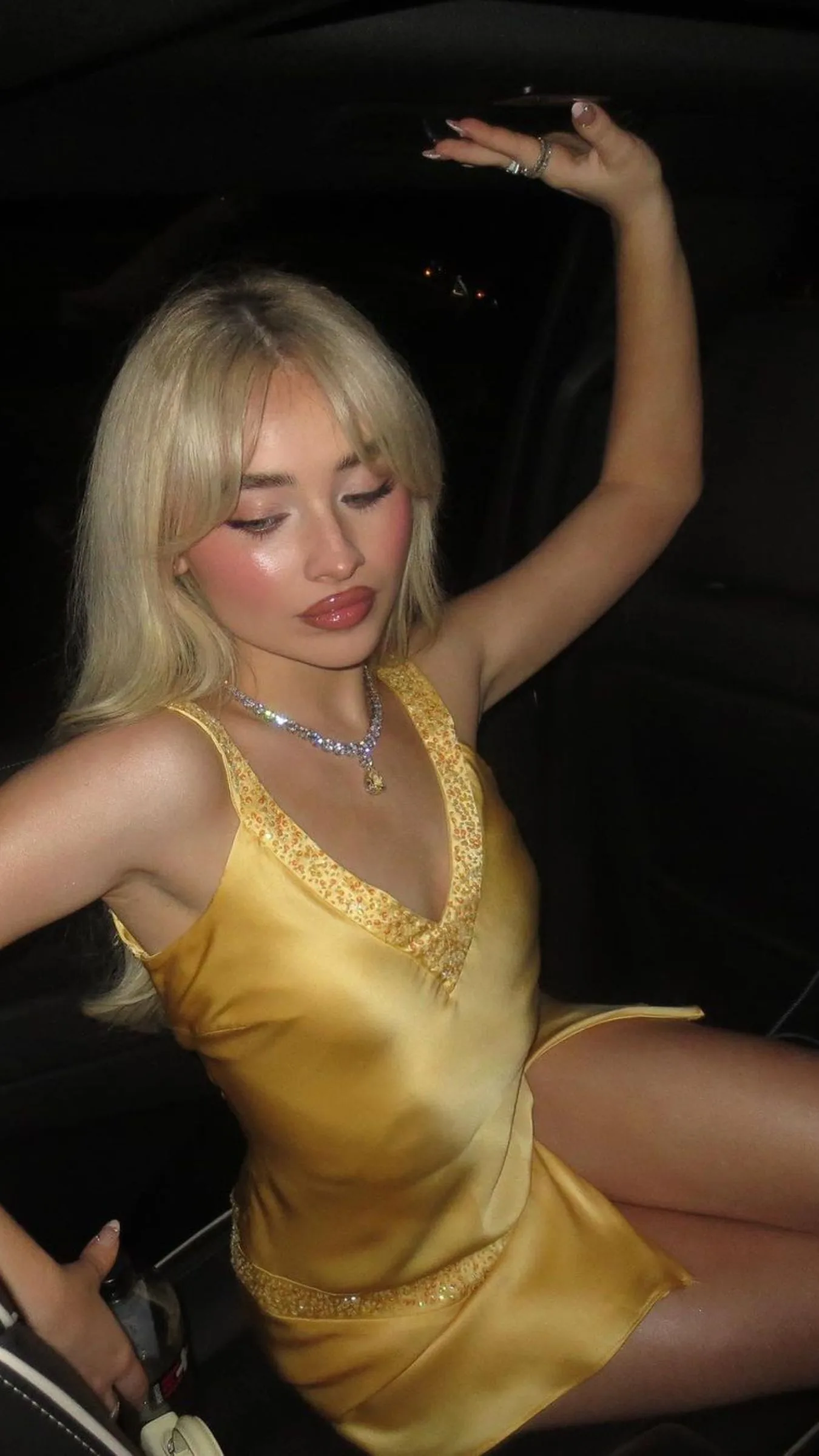 Sabrina Carpenter's butter yellow mini dress