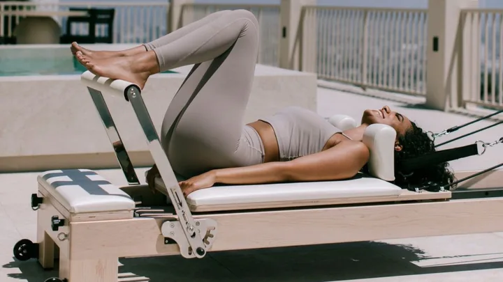 Say Goodbye To The Studio And Hello To An At-Home Pilates Reformer Machine