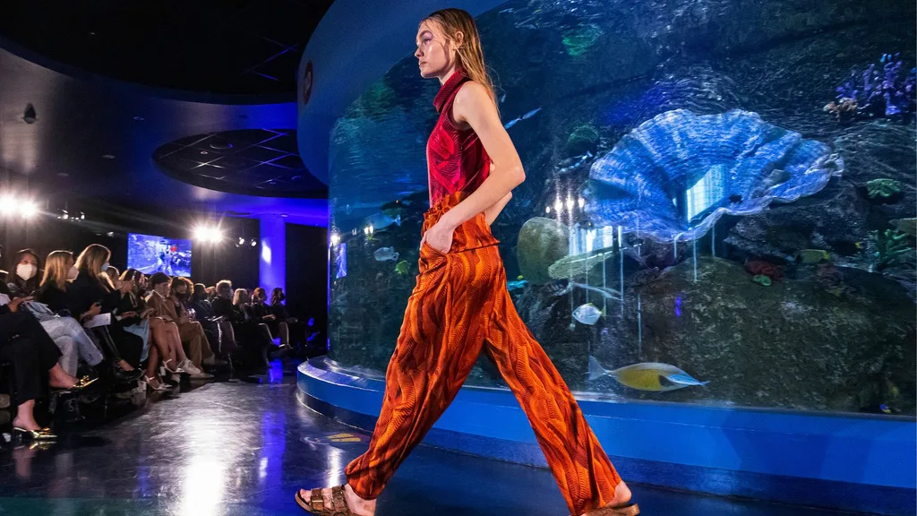 A model walks the runway in a design by Grace Lillian Lee during the Aquarium runway show at Melbourne Fashion Week at Sea Life Aquarium on November 17, 2021 in Melbourne, Australia.