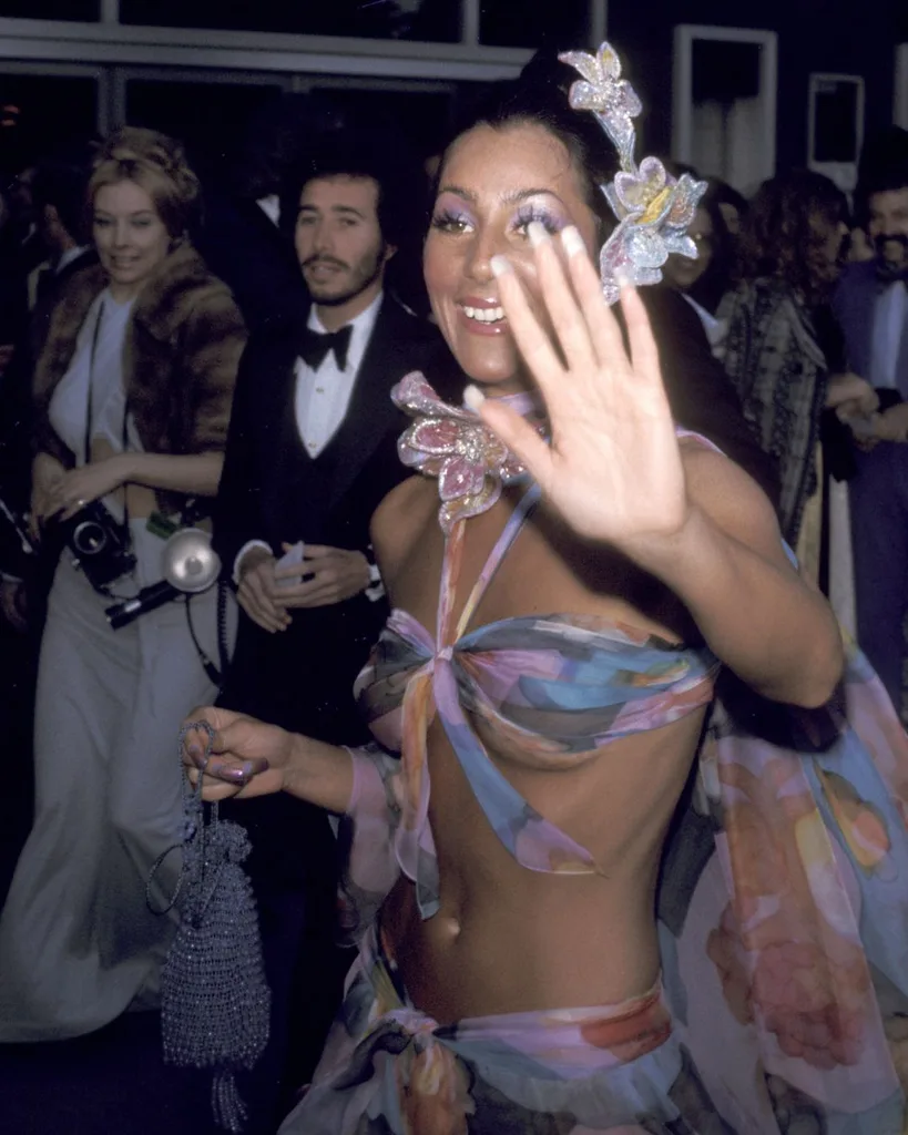 21 Iconic Cher Looks That Prove She Invented The 'Naked Dress'