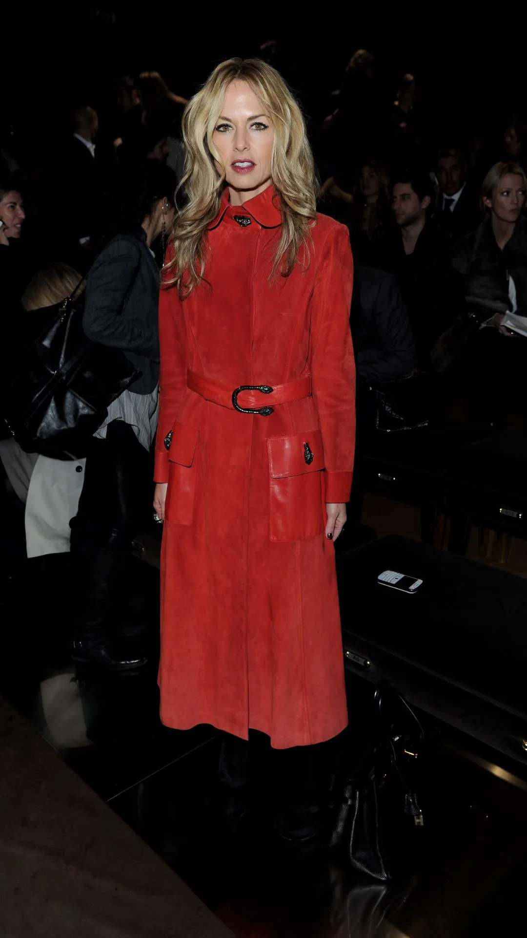 rache zoe wears a red suede gucci coat