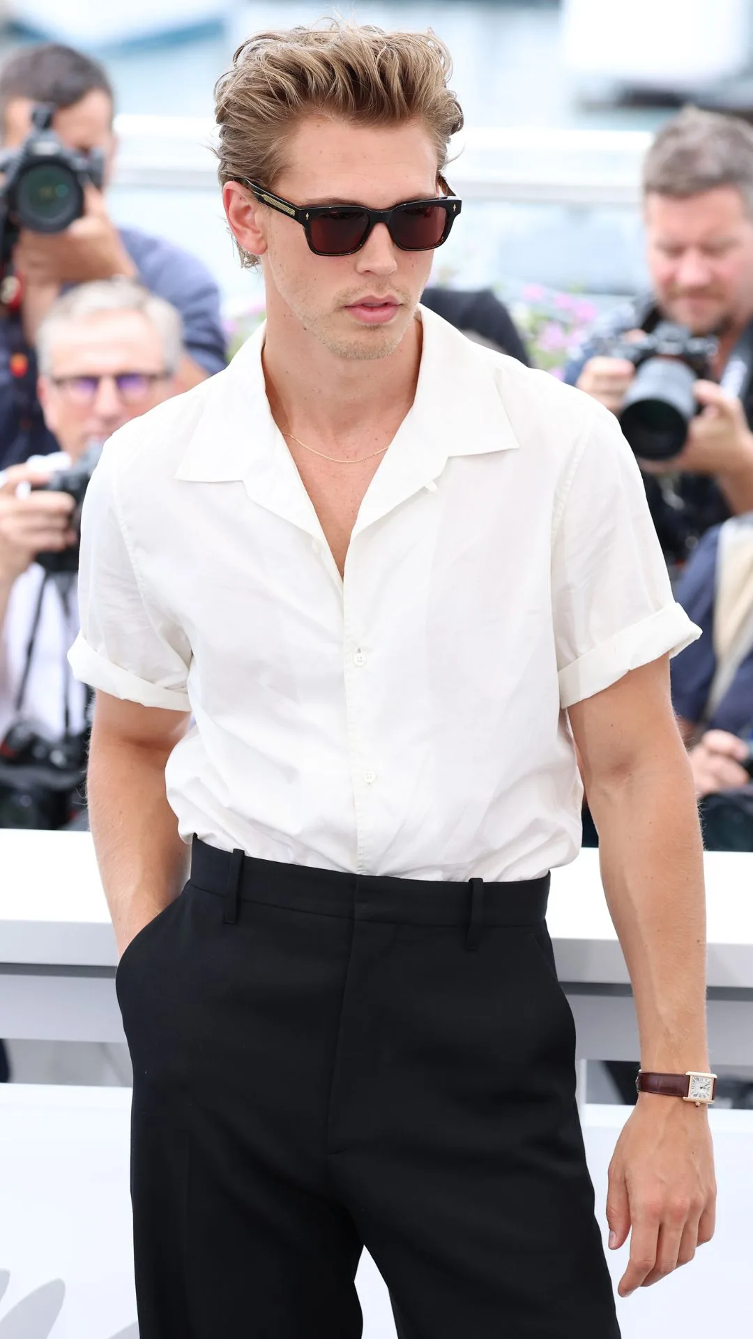 Austin Butler attends the photocall for "Elvis" during the 75th annual Cannes film festival at Palais des Festivals on May 26, 2022 in Cannes, France.