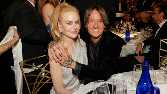 nicole kidman and keith urban cuddle up behind the scenes at the golden globes