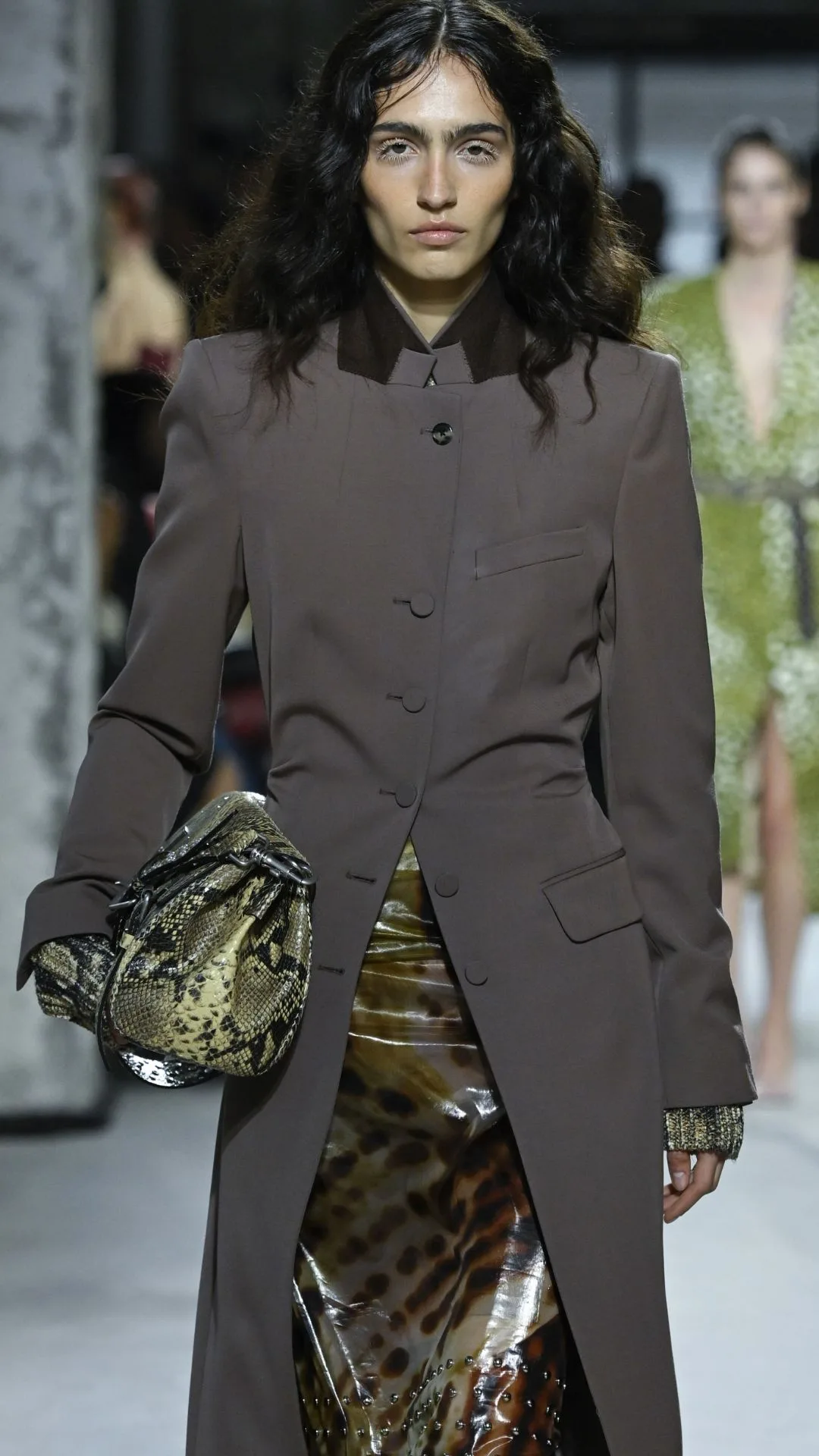  A model walks the runway during the Dries Van Noten Ready to Wear Spring/Summer 2025 fashion show as part of the Paris Fashion Week on September 25, 2024 in Paris, France. 