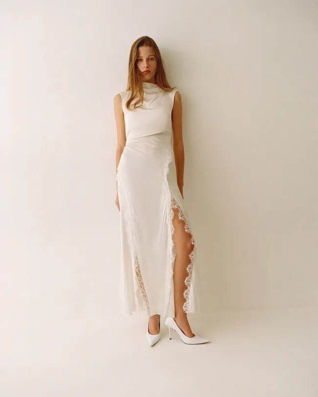 lucero silk panelled maxi dress ivory In Process Lucero Silk Draped Corset Split Maxi Dress. Crafted from a 100% pure silk, Dupion, discover the statement silhouette with elegant side splits and contoured bodice. Shop the latest bridal
