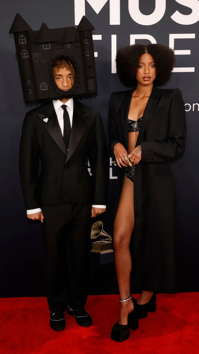 jaden smith dressed with a house over his head at the 2025 grammys red carpet with willow smith