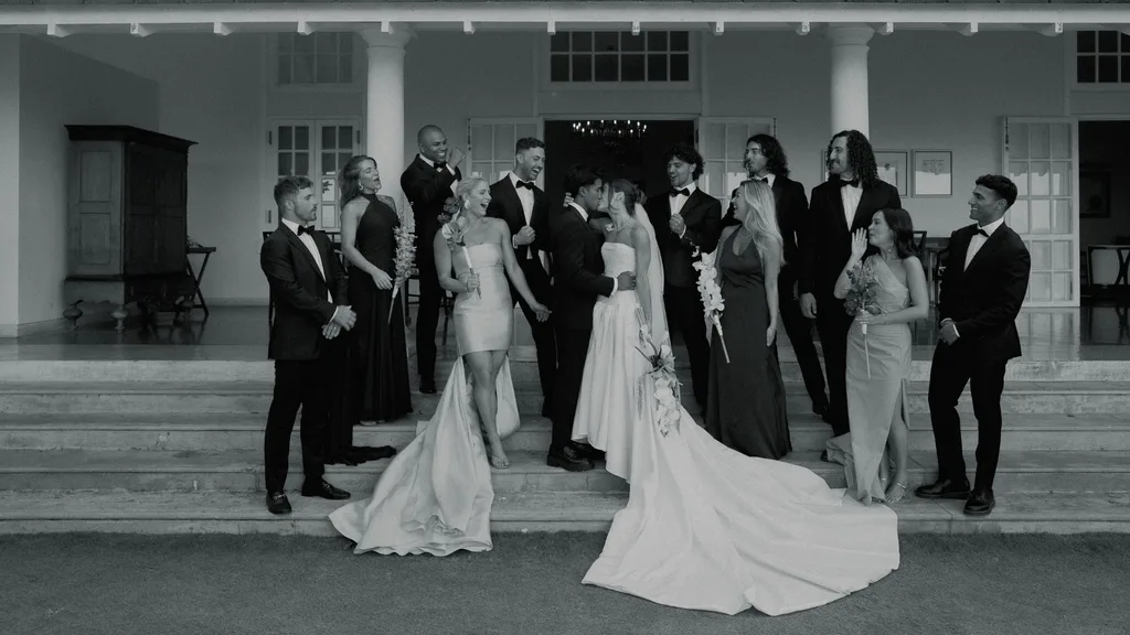 Lauren Sebastiani and husband Danny Cooray with family and friends on their wedding day.