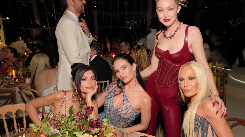 Donatella Versace flanked by models at the Met Gala
