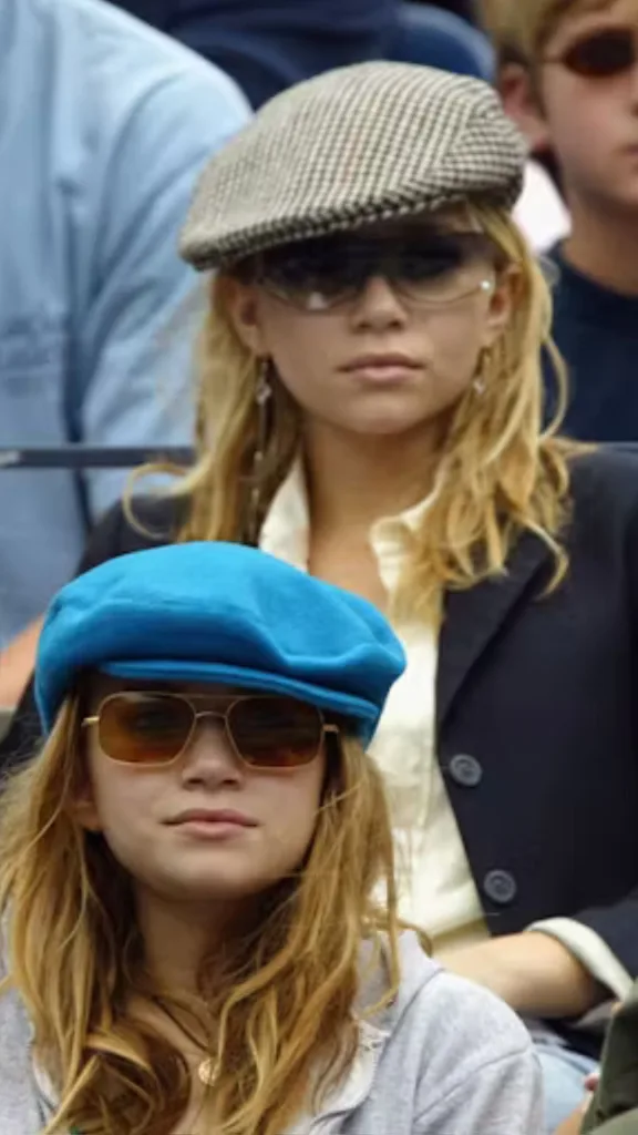 The olsen twins wearing baker boys hats in a New York Minute