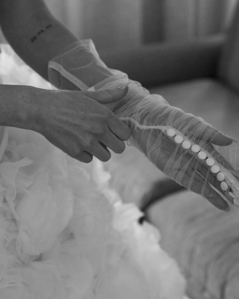 Bride putting on gloves