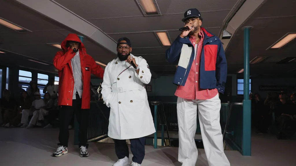 Members of the Wu-Tang clan on the catwalk for the Tommy Hilfiger fashion parade during New York 2024 Fashion Week.