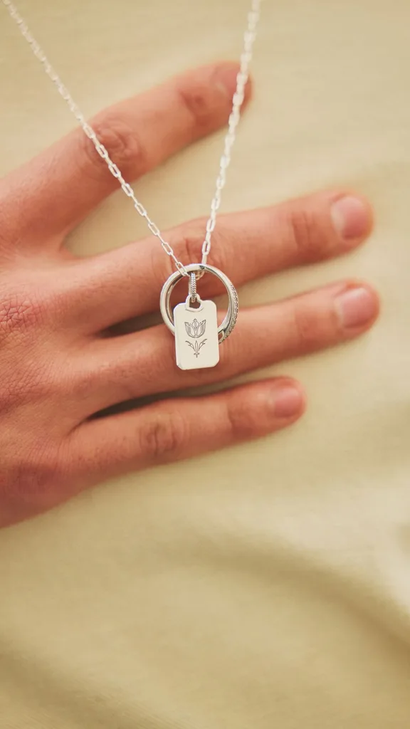 Model backstage with custom engraved Pandora pendant necklace at Alix Higgins Show Australian Fashion Week 2025