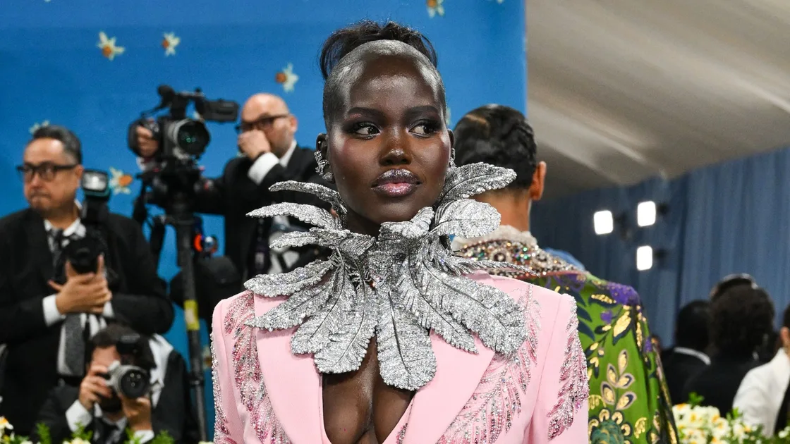 Met Gala 2024: Adut Akech Stuns in Dazzling Crystal-Encrusted Feather Collar