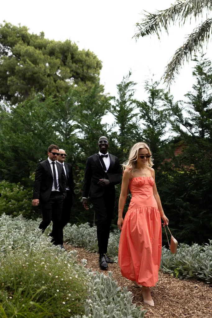 Guests arriving at the wedding