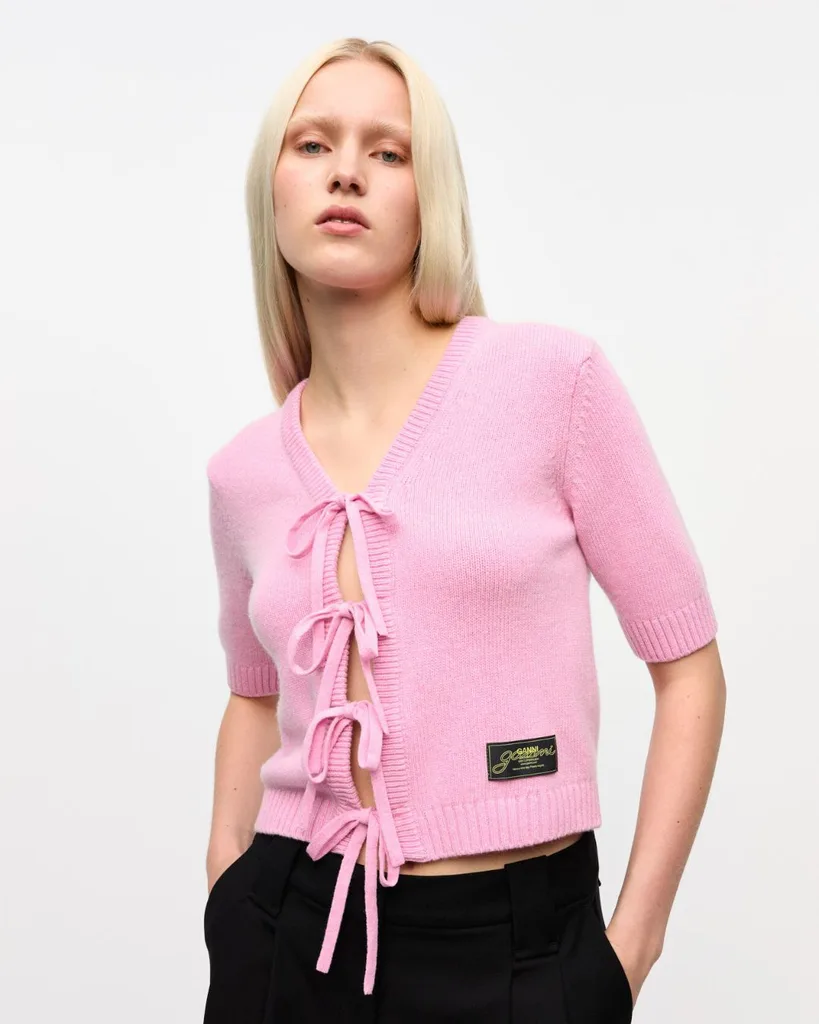 Model wearing pink Ganni knit top