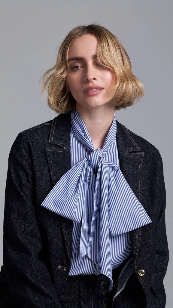 Model Wearing pussy bow blouse from Elle Get The Look x TVSN collection