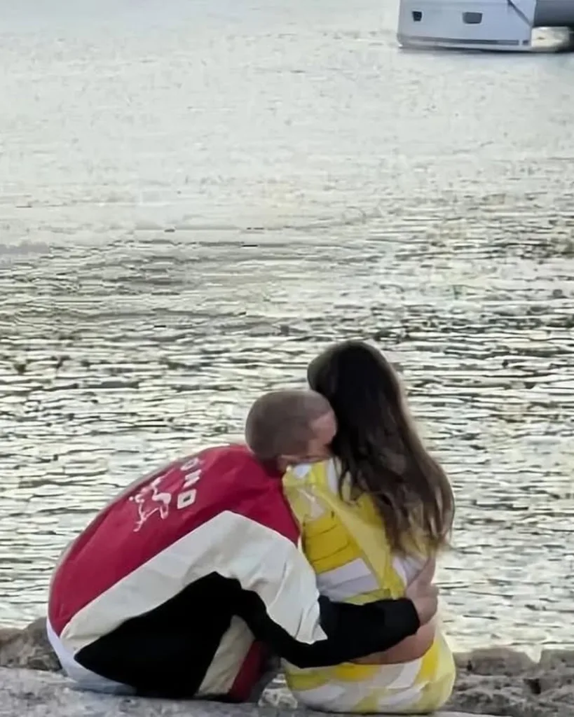 Justin Bieber and Hailey Bieber embracing on the beach