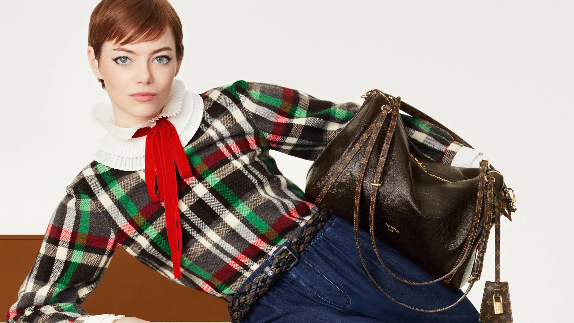 Emma Stone wearing the Louis Vuitton Express