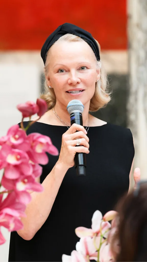 Pamela Anderson giving a speech