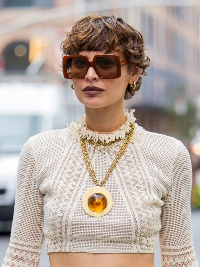 Guest with "bixie" cut at new york fashion week 