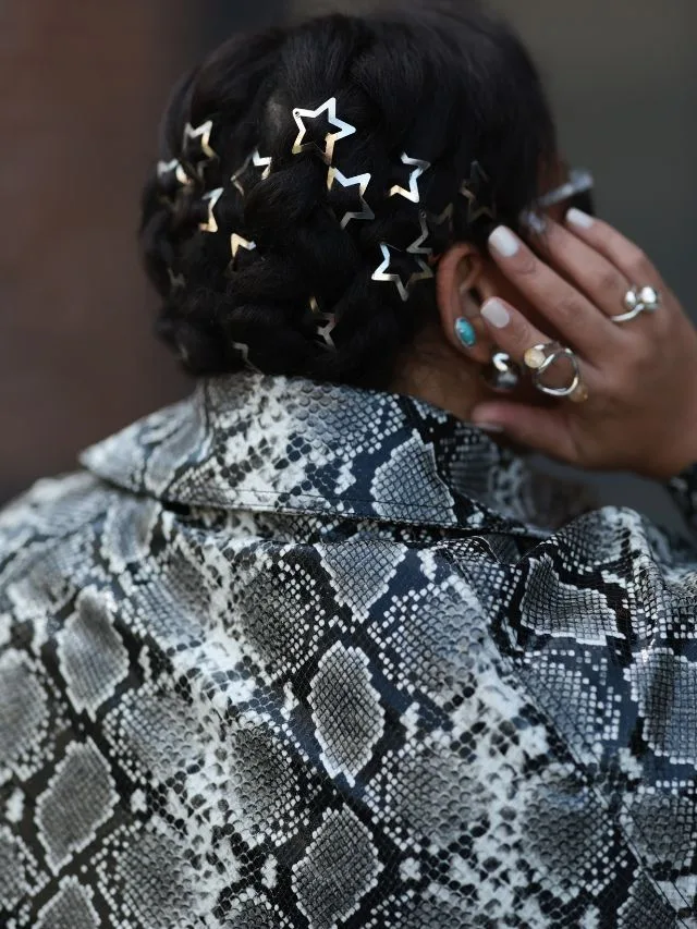 New York fashion week attendee wearing silver star shaped hair clips 