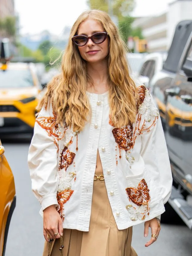 new york fashion week attendee with rapunzel style long hair