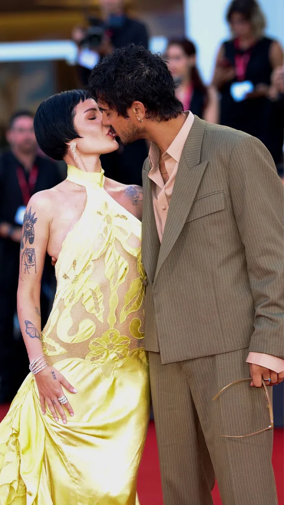 Halsey kisses fiance Avan Jogia on the Venice film festival red carpet