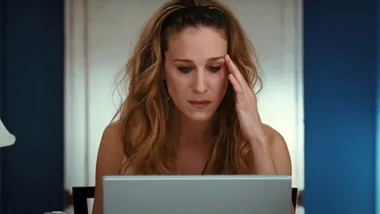 Carrie Bradshaw on her laptop