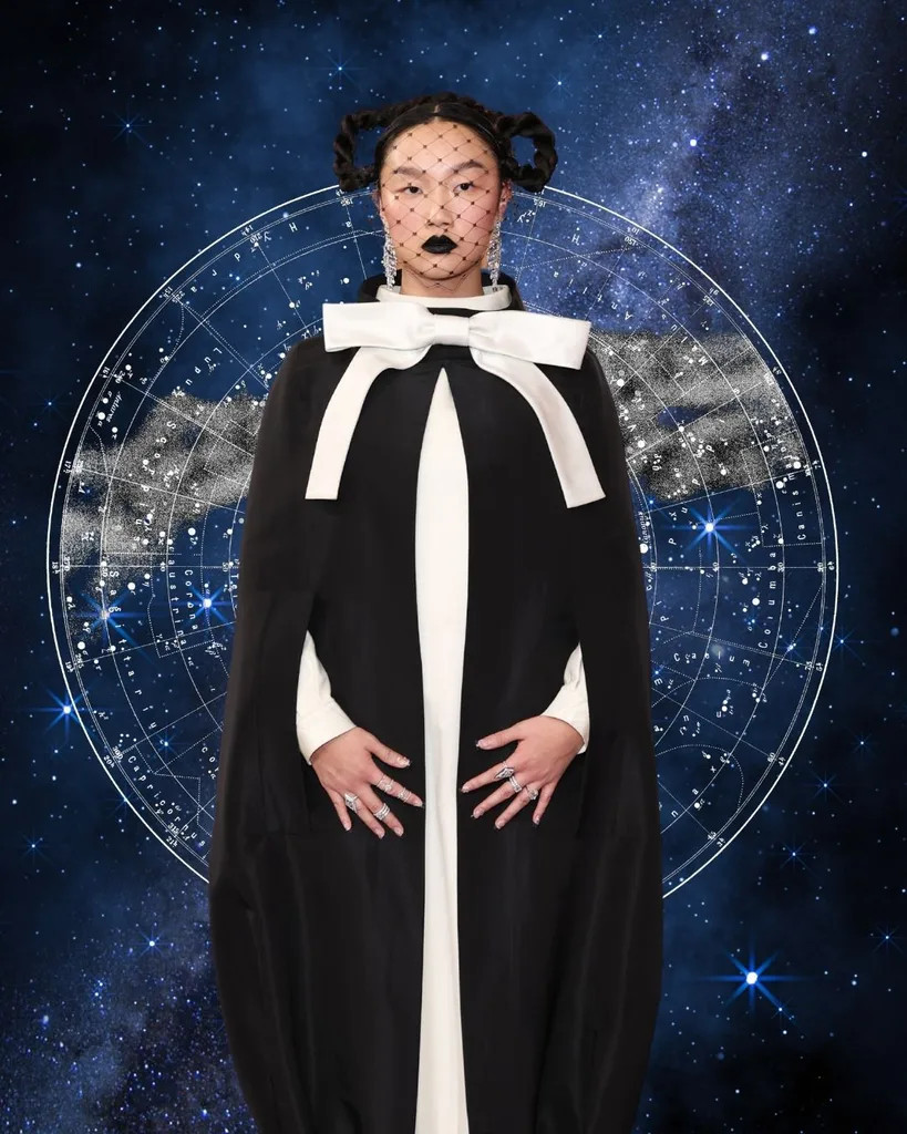 Audrey Nuna on a galaxy backdrop